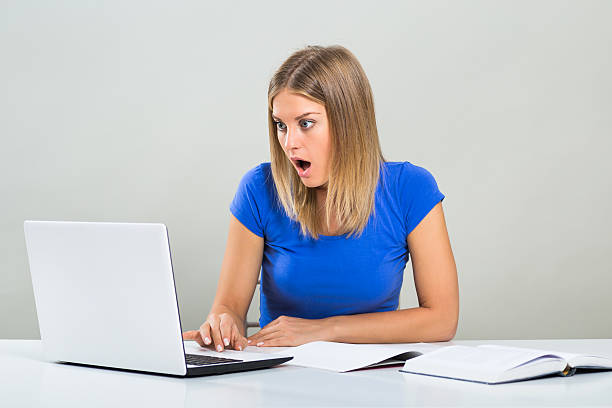 Free Stock Photo of Shocked woman reading unexpected information on ...