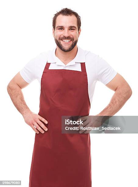 Smiling Man With Red Apron Stock Photo - Download Image Now - Butcher, Cut Out, Apron