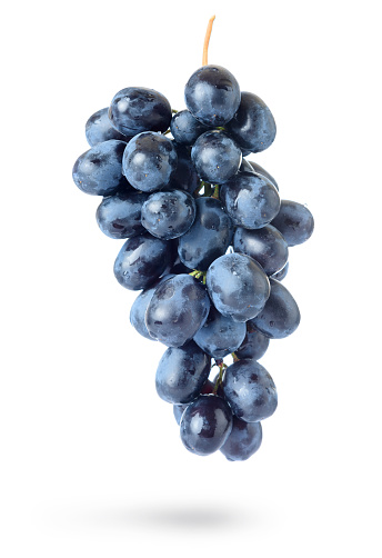 Bunch of grapes with water drops, isolated on white background