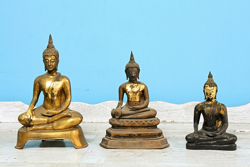 Antique Buddha statue set, Religion sculpture, Faith symbol.