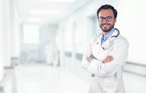 istock smiling doctor in hospital with copy space 598682150