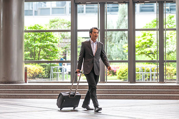 istock Business executive running to catch his next meeting. 598682198