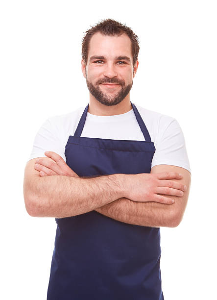 istock Man in blue apron with arms crossed 598682876
