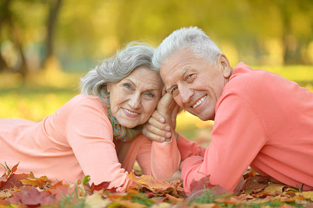 istock Senior couple in autumn park 598683642