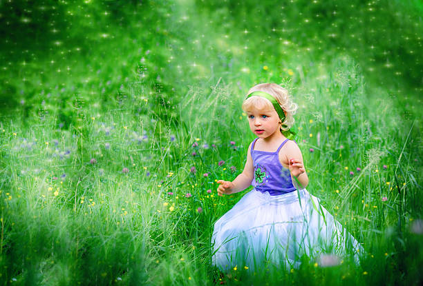 istock Baby Girl in a Meadow 598684252