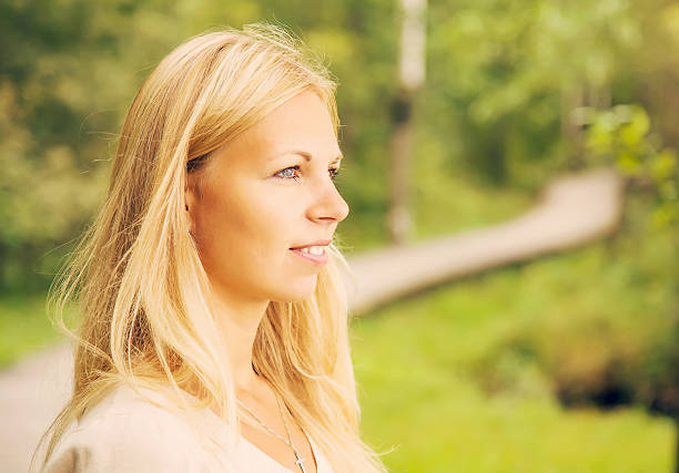 istock Young, charming, beautiful woman in gentle atmosphere looking somewhere... 598685338