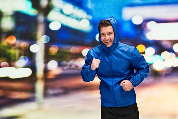 istock Smiling male running outdoors 598685948