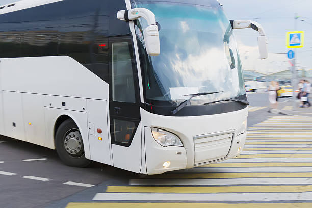 istock bus at the city intersectio 598687874