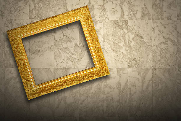 istock Antique old picture frame on marble wall 598688222