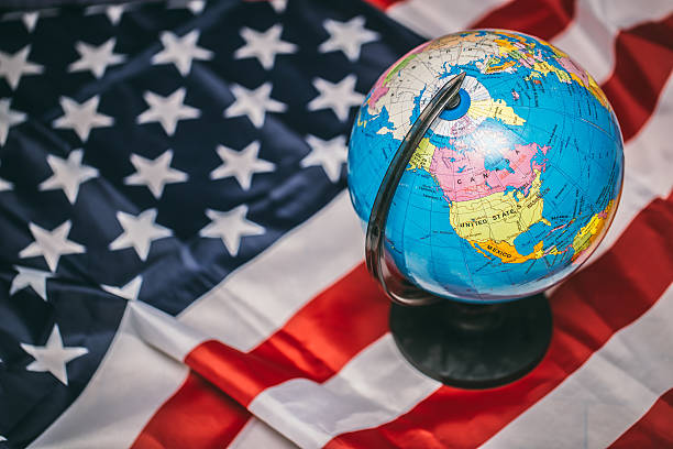 istock American flag and world map 598688632