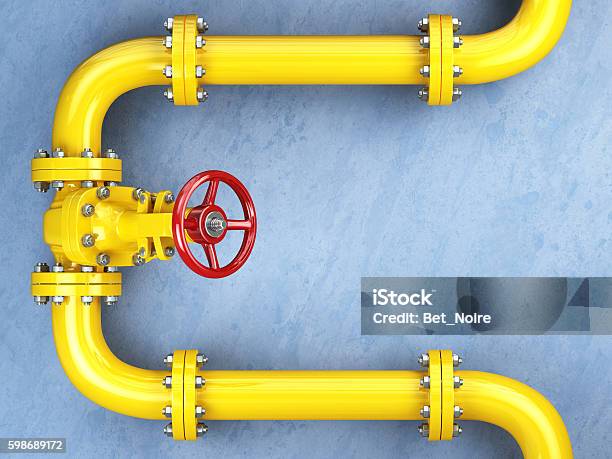 Photo libre de droit de Vanne De Gazoduc Jaune Sur Une Paroi Bleue banque d'images et plus d'images libres de droit de Gaz naturel - Gaz naturel, Tuyauterie, Pipeline