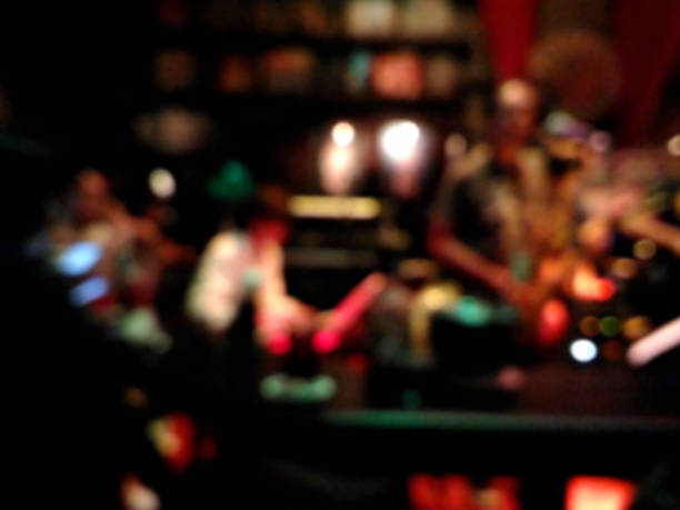 Blurred musicians playing jazz music at the pub