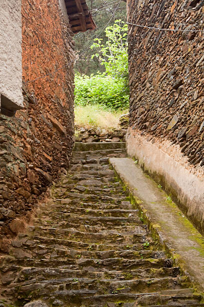 istock Village alley with staircase. 598690270