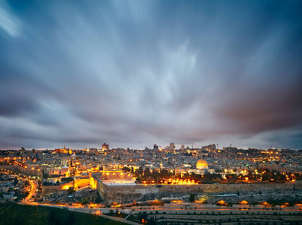 dramatic clouds over jerusalem old city, israel - jerusalem israel skyline panoramic imagens e fotografias de stock