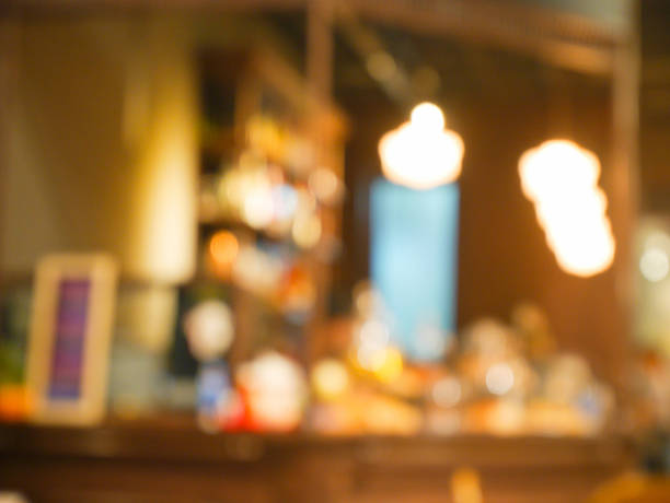 istock Blurred counter and bokeh light in cafe 598691658