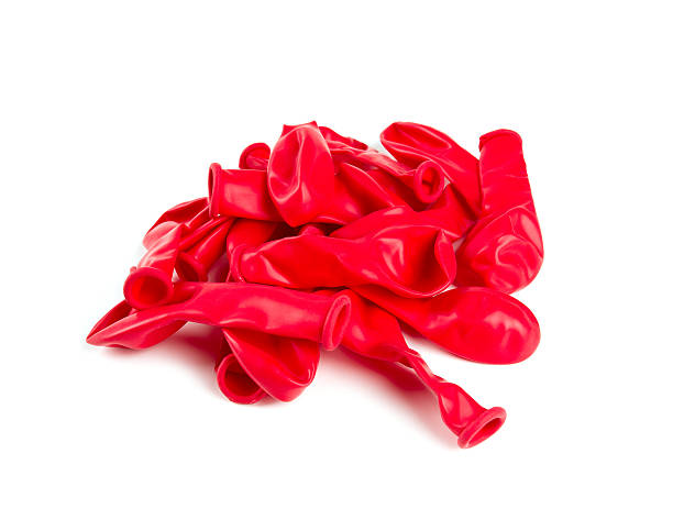 istock deflated red air ballons isolated on white 598694426