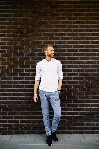 istock Handsome male listening music 598694796