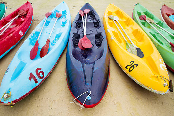istock Colourful sea kayaks on the beach.Thailand 598695064