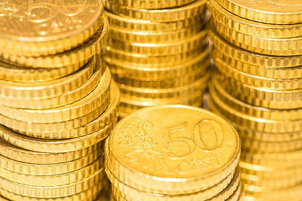 istock Close up image of stacks of gold coins 598700558