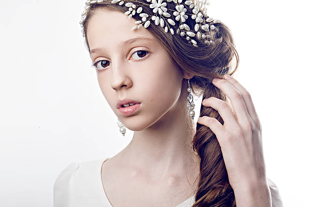 istock pretty young girl with hairstyle 598703522