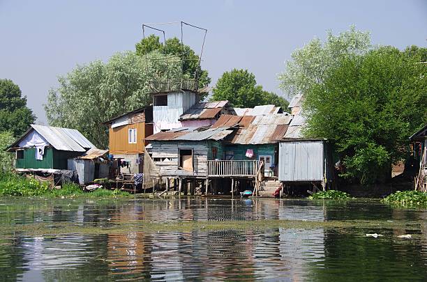 Village near Srinagar in Kashmir, India Small village on the Nagin lake near Srinagar in Kashmir, India lake nagin stock pictures, royalty-free photos & images