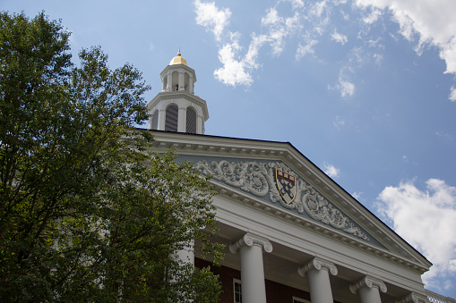 Cambridge, United States - August 19, 2016: Harvard's Baker Library under blue sky