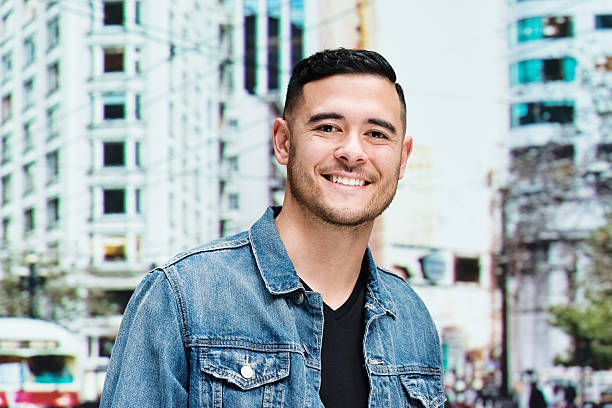 istock Smiling man standing outdoors 598706376