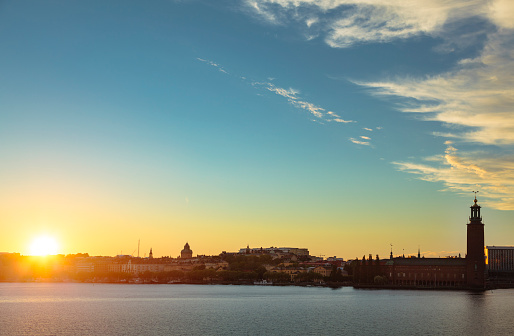 Skyline of Stockholm with town hall at sunset (Stockholm, Sweden)