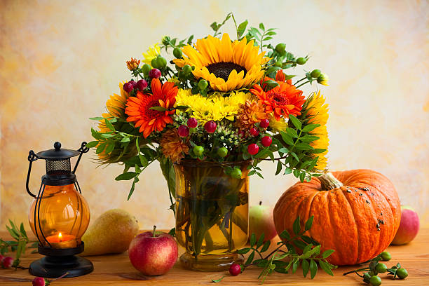 Autumn flowers and pumpkin Autumn still life with flowers, pumpkin and fruits single flower flower autumn pumpkin stock pictures, royalty-free photos & images