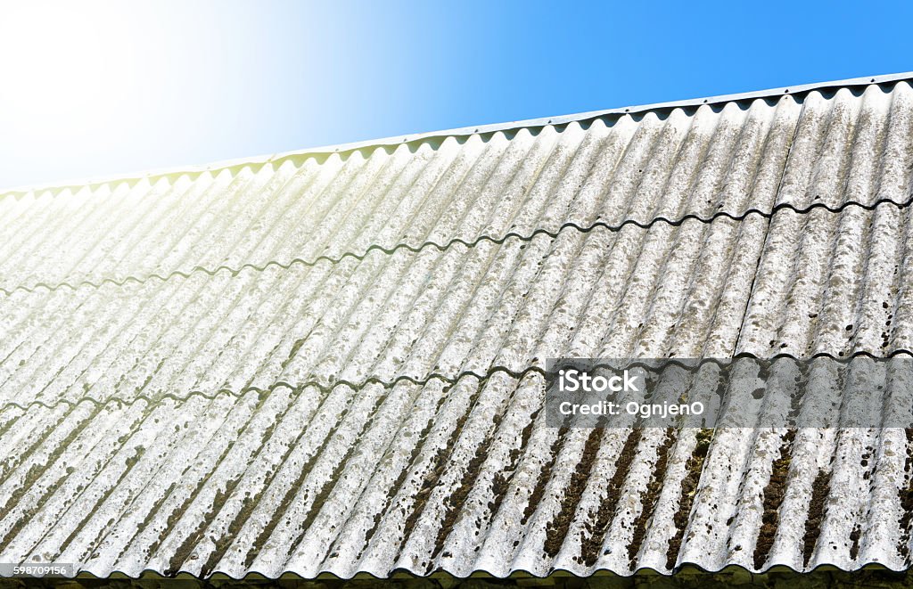 Asbestos roof with blue sky Asbestos roof with blue sky  Architecture Stock Photo