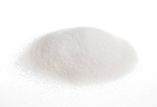 istock Pile of sugar isolated on white 598709704