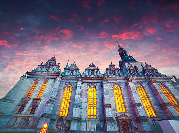 Dramatic spring sunset in Wolfenbuttel village, caled Little Venice. View of Holy Trinity Church in Wolfenbuttel, Niedersachsen, Germany, Europe.