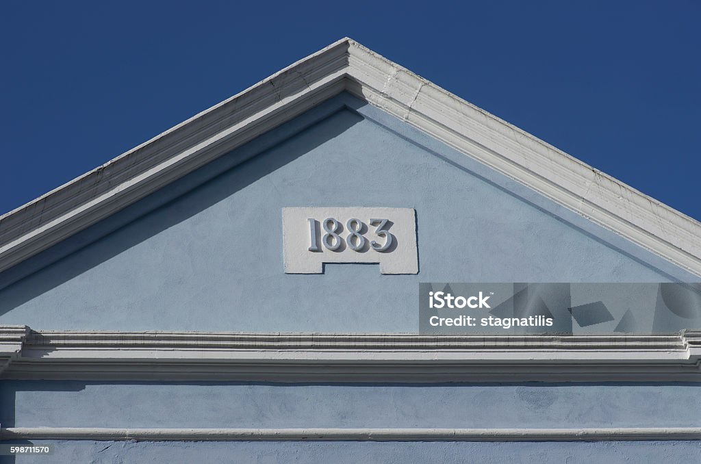 Blue rooftop against blue sky. House built in 1883, London, Europe. 1883 Stock Photo