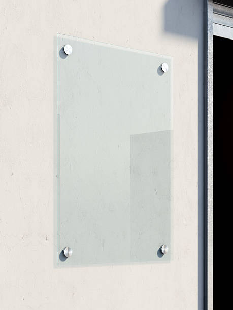 istock Blank glass signboard on the wall . 3d renderign 598711872