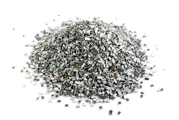 istock Electronic components in bulk. Texture of chip resistors 598712492