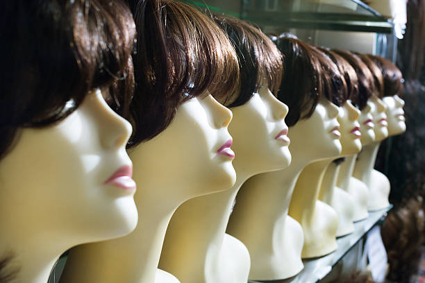 istock Dummies heads with hair style in shop 598712572