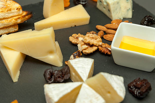 istock different types of cheeses with dried fruits 598715290