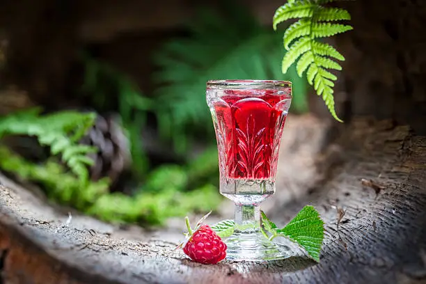 Healthy raspberries liqueur made of fruits and alcohol
