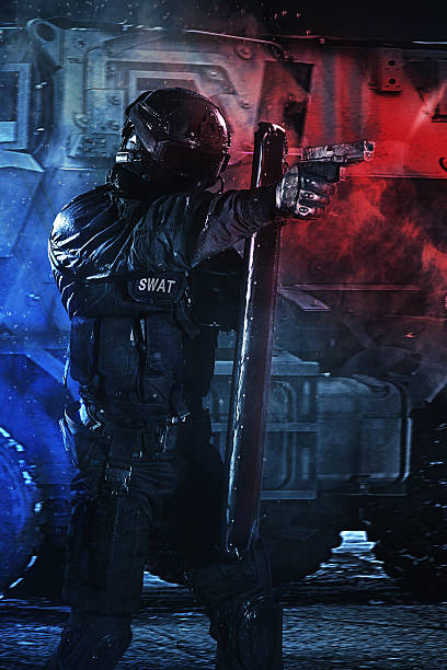 istock police officer with ballistic shield 598717598