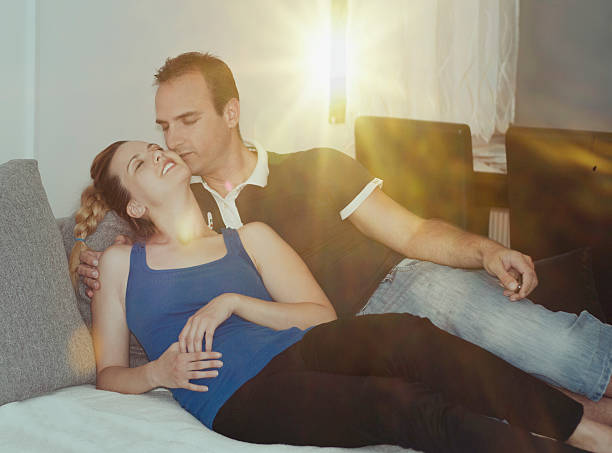 istock Couple in love at home on sunrise. 598782542
