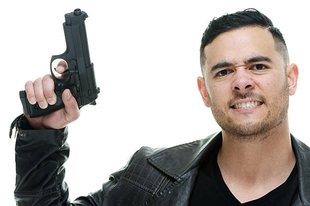 istock Casual man being angry with handgun 598782924