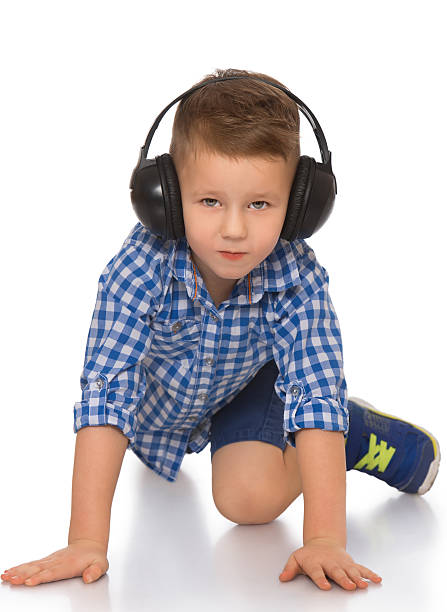 istock Boy in headphones 598787696