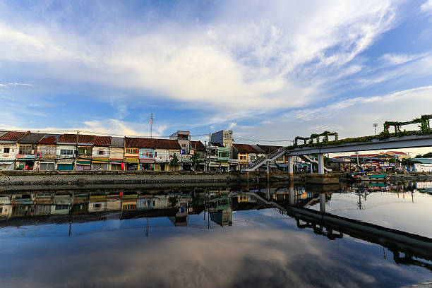 Ho Chi Minh City, Vietnam - September 2, 2014: Binh Dong wharf on Tau Hu canal at Ho Chi Minh City, Vietnam in the sunrise or sunset. This is also called Saigon old town with many old houses