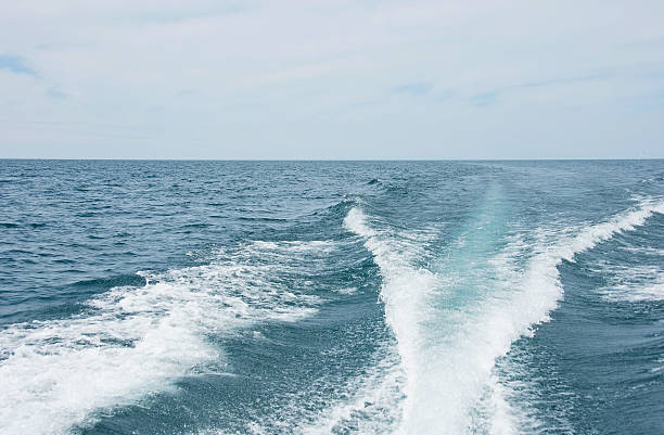istock boat wake on Lake Michigan 598790676
