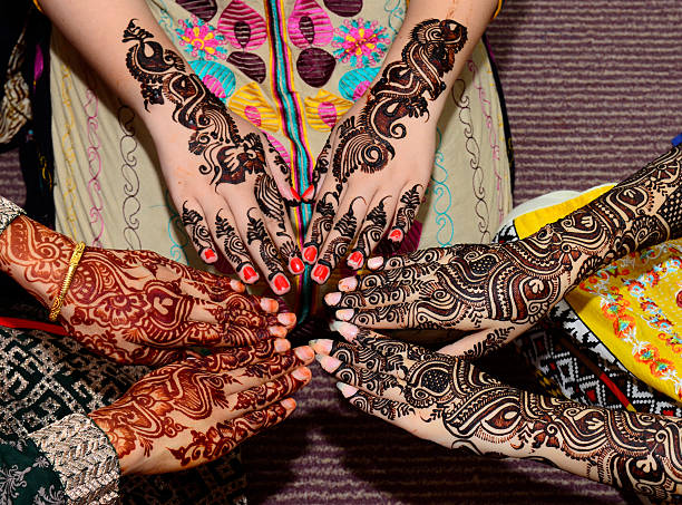 Henna hands 3 pairs of henna decorated female hands arranged in a circle MEHNDI stock pictures, royalty-free photos & images