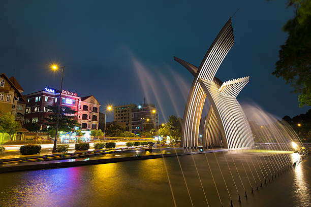Ho Chi Minh City, Vietnam - December 13, 2014: night view Metal Sculpture or peaceful monument, welcome statue at Hoang Van Thu Park on Truong Son street from Tan Son Nhat airport to downtown Ho Chi Minh City, Vietnam .