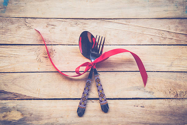 istock Valentines dinner on wooden background with space. Vintage style 598795194