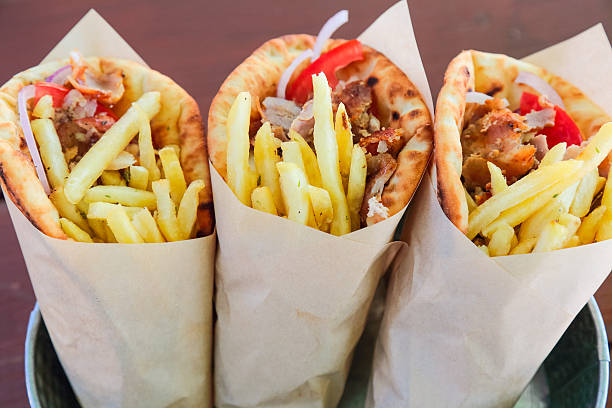 Three portion of Gyros pita, traditional Greek fast food.