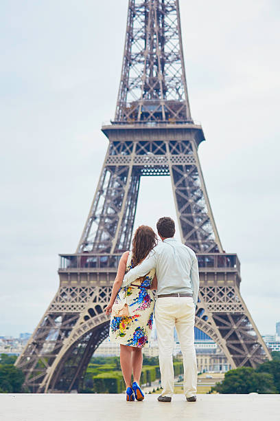 istock Romantic loving couple having a date near the Eiffel tower 598797504