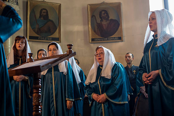 Sunday prayer in Armenian apostolic church in Echmiadzin. Vagharsapat, Armenia - October 27, 2012 : Sunday prayer in Armenian apostolic church in Echmiadzin, Armenia. jusus stock pictures, royalty-free photos & images